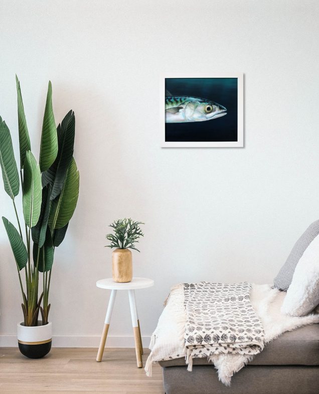 Framed mackerel painting hanging on a wall in a room
