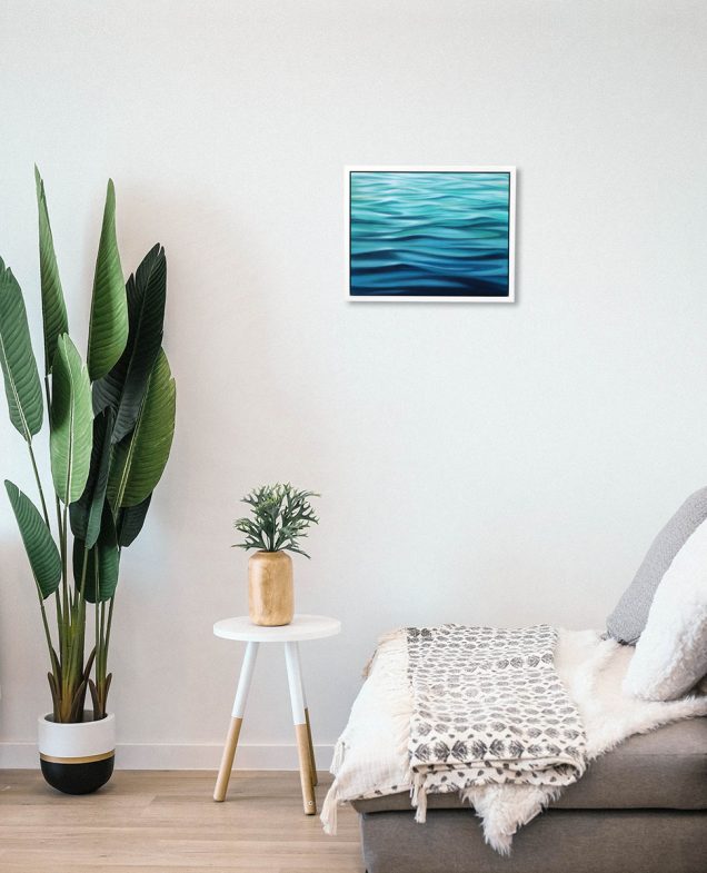 Painting of sea hanging in a room