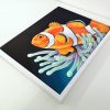 Framed painting of a Clownfish