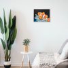 Painting of a Clownfish hanging in a room