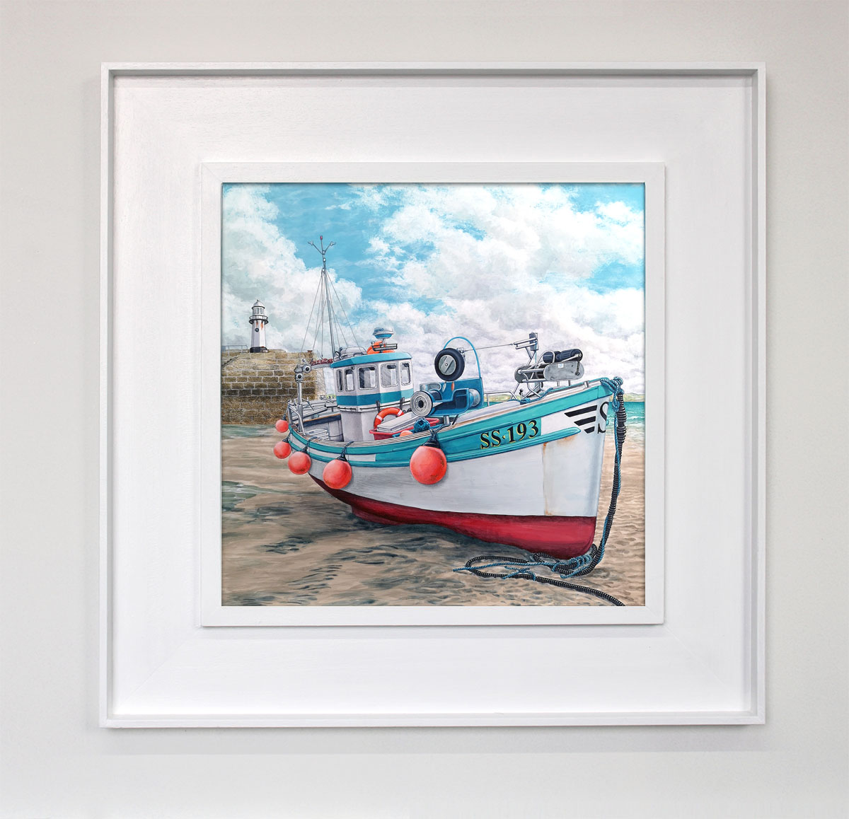 Framed painting of a fishing boat at low tide, St Ives