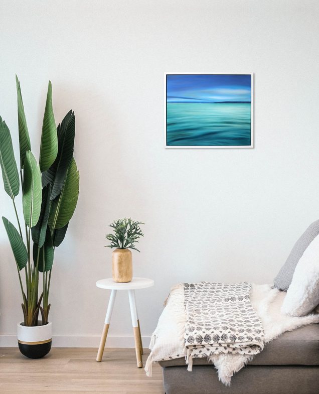 Tranquil sea painting hanging in a room