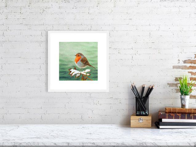Print of a robin in a white picture frame and mount