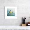 Print of a blue tit in a white picture frame and mount