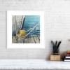 Boat mooring print in a white frame